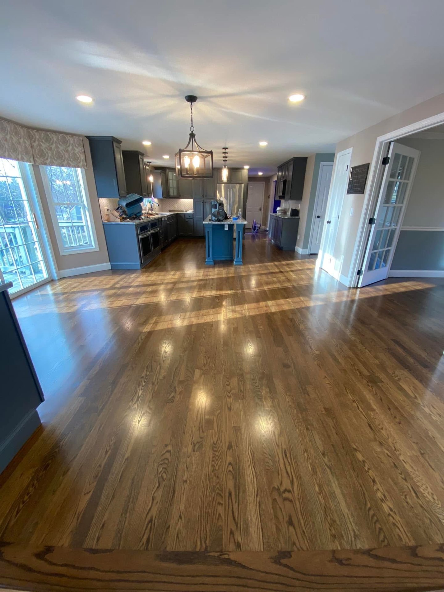 Refinished red oak — open-concept kitchen & living